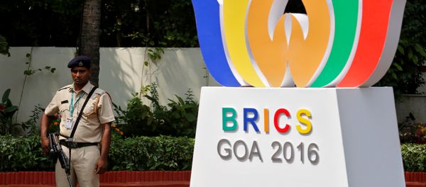 A security personnel stands guard outside one of the venues of BRICS (Brazil, Russia, India, China and South Africa) Summit, in Benaulim in the western state of Goa, India, October 14, 2016. - Sputnik International