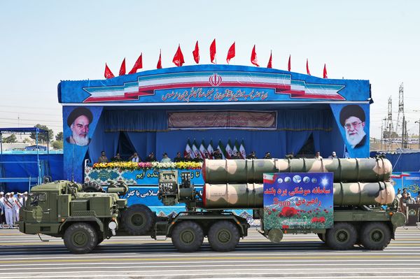 In front of the portraits of supreme leader Ayatollah Ali Khamenei, right, and late revolutionary founder Ayatollah Khomeini, left, a long-range, S-300 missile system is displayed by Iran's army during a military parade marking the 36th anniversary of Iraq's 1980 invasion of Iran, in front of the shrine of late revolutionary founder Ayatollah Khomeini, just outside Tehran, Iran, Wednesday, Sept. 21, 2016 In front of the portraits of supreme leader Ayatollah Ali Khamenei, right, and late revolutionary founder Ayatollah Khomeini, left, a long-range, S-300 missile system is displayed by Iran's army during a military parade marking the 36th anniversary of Iraq's 1980 invasion of Iran, in front of the shrine of late revolutionary founder Ayatollah Khomeini, just outside Tehran, Iran, Wednesday, Sept. 21, 2016 - Sputnik International