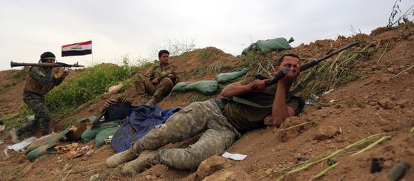 Iraqi Security forces and allied Popular Mobilization forces take combat positions during a military operation to regain control of Islamic State group held town of Besher outside the oil-rich city of Kirkuk (File) Iraqi Security forces and allied Popular Mobilization forces take combat positions during a military operation to regain control of Islamic State group held town of Besher outside the oil-rich city of Kirkuk (File) - Sputnik International