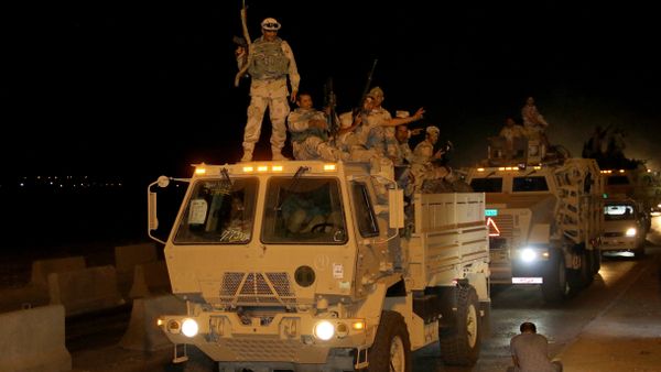 Iraqi army soldiers drive through the city of Kirkuk on October 10, 2016 as they head to the frontline in preparation for the battle to retake the city of Mosul Iraqi army soldiers drive through the city of Kirkuk on October 10, 2016 as they head to the frontline in preparation for the battle to retake the city of Mosul - Sputnik International