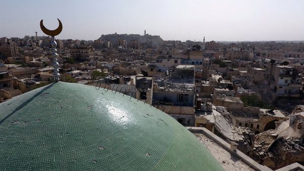A view taken with a drone shows the minaret of Osama Bin Zayed mosque along with damaged buildings in the old city of Aleppo, Syria, October 13, 2016 A view taken with a drone shows the minaret of Osama Bin Zayed mosque along with damaged buildings in the old city of Aleppo, Syria, October 13, 2016 - Sputnik International