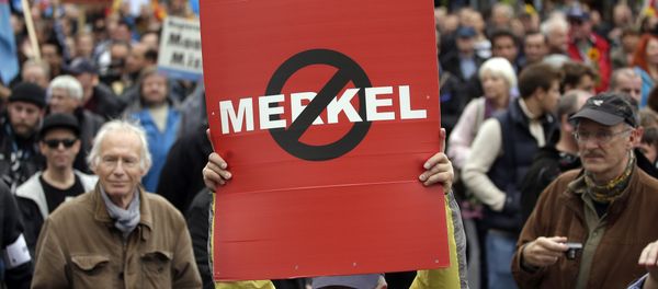 People take part in a protest rally of the German party 'Alternative fuer Deutschland, AfD' (Alternative for Germany) in Berlin, Germany, Saturday, Nov. 7, 2015 People take part in a protest rally of the German party 'Alternative fuer Deutschland, AfD' (Alternative for Germany) in Berlin, Germany, Saturday, Nov. 7, 2015 - Sputnik International