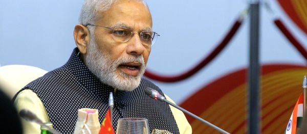 Indian Prime Minister Narendra Modi seen here at Taj Exotica Goa hotel, India at the BRICS Summit restricted meeting Indian Prime Minister Narendra Modi seen here at Taj Exotica Goa hotel, India at the BRICS Summit restricted meeting - Sputnik International