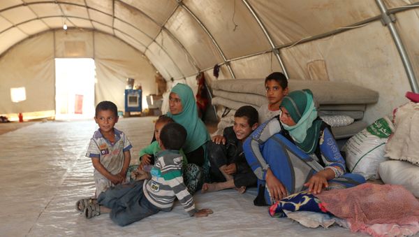 Displaced people who fled Mosul are pictured at a refugee camp in Duhok, Iraq, October 16, 2016 - Sputnik International