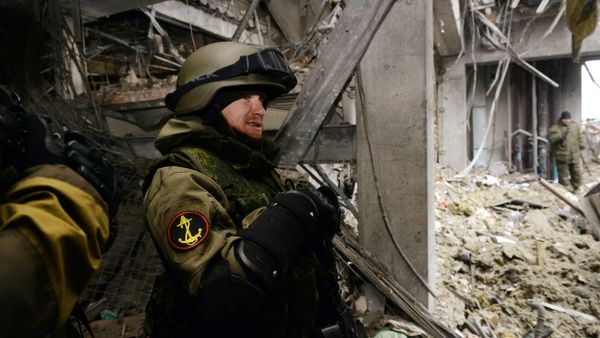 Arseny Pavlov, also known by his nickname 'Motorola', stands inside a destroyed airport building in the eastern Ukrainian city of Donetsk, on February 26, 2015 Arseny Pavlov, also known by his nickname 'Motorola', stands inside a destroyed airport building in the eastern Ukrainian city of Donetsk, on February 26, 2015 - Sputnik International