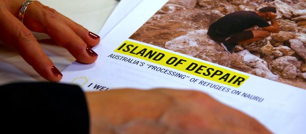 Anna Neistat, Senior Director for Research with Amnesty International, talks to journalists as she holds a copy of a report she co-authored titled 'Island of Despair - Australia's Processing of Refugees on Nauru' in Sydney, Australia, October 17, 2016 Anna Neistat, Senior Director for Research with Amnesty International, talks to journalists as she holds a copy of a report she co-authored titled 'Island of Despair - Australia's Processing of Refugees on Nauru' in Sydney, Australia, October 17, 2016 - Sputnik International