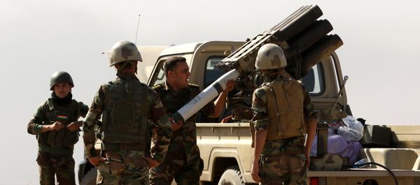 Iraqi Kurdish Peshmerga fighters fire a multiple rocket launcher from the top of Mount Zardak, about 25 kilometres east of Mosul, as they take part in an operation against Islamic State (IS) group jihadists, on October 17, 2016 Iraqi Kurdish Peshmerga fighters fire a multiple rocket launcher from the top of Mount Zardak, about 25 kilometres east of Mosul, as they take part in an operation against Islamic State (IS) group jihadists, on October 17, 2016 - Sputnik International