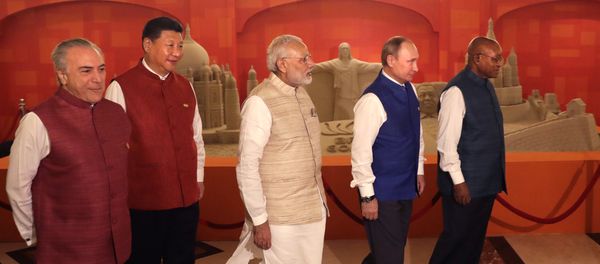 Leaders of BRICS nations, from left, Brazilian President Michel Temer, Chinese President Xi Jinping, Indian Prime Minister Narendra Modi, Russian President Vladimir Putin and South African President Jacob Zuma walk past sand sculptures of famous landmarks of BRICS nations created by Indian sand artist Sudarsan Pattnaik, prior to dinner hosted by Modi in Goa, India, Saturday, Oct. 15, 2016 Leaders of BRICS nations, from left, Brazilian President Michel Temer, Chinese President Xi Jinping, Indian Prime Minister Narendra Modi, Russian President Vladimir Putin and South African President Jacob Zuma walk past sand sculptures of famous landmarks of BRICS nations created by Indian sand artist Sudarsan Pattnaik, prior to dinner hosted by Modi in Goa, India, Saturday, Oct. 15, 2016 - Sputnik International