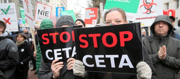 People protest against the planned CETA free trade agreement (Comprehensive Economic and Trade Agreement) between the European Union and Canada, and similar plans between EU and United States (TTIP) in Warsaw, Poland October 15, 2016 People protest against the planned CETA free trade agreement (Comprehensive Economic and Trade Agreement) between the European Union and Canada, and similar plans between EU and United States (TTIP) in Warsaw, Poland October 15, 2016 - Sputnik International