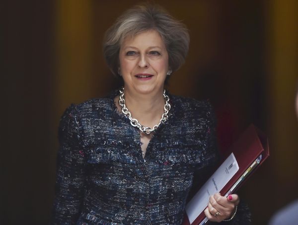 Britain's Prime Minister Theresa May leaves Number 10 Downing Street to attend Prime Minister's Questions at parliament in London, Britain October 19, 2016. Britain's Prime Minister Theresa May leaves Number 10 Downing Street to attend Prime Minister's Questions at parliament in London, Britain October 19, 2016. - Sputnik International