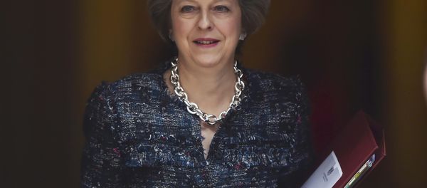 Britain's Prime Minister Theresa May leaves Number 10 Downing Street to attend Prime Minister's Questions at parliament in London, Britain October 19, 2016. - Sputnik International
