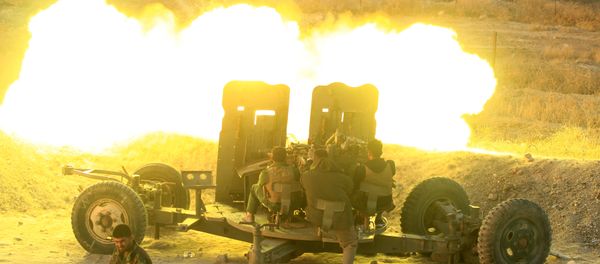 Peshmerga forces fire an anti-aircraft gun towards Islamic state militants positions in the town of Naweran near Mosul, Iraq, October 20, 2016. Peshmerga forces fire an anti-aircraft gun towards Islamic state militants positions in the town of Naweran near Mosul, Iraq, October 20, 2016. - Sputnik International