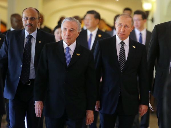 Russian President Vladimir Putin and President of Brazil Michel Temer, second left, seen here at Taj Exotica Goa hotel, India at the BRICS Summit Russian President Vladimir Putin and President of Brazil Michel Temer, second left, seen here at Taj Exotica Goa hotel, India at the BRICS Summit - Sputnik International