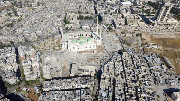 A general view taken with a drone shows a mosque where forces loyal to Syria's President Bashar al-Assad are stationed in Aleppo's government-controlled area of al-Masharqa, Syria October 20, 2016. A general view taken with a drone shows a mosque where forces loyal to Syria's President Bashar al-Assad are stationed in Aleppo's government-controlled area of al-Masharqa, Syria October 20, 2016. - Sputnik International