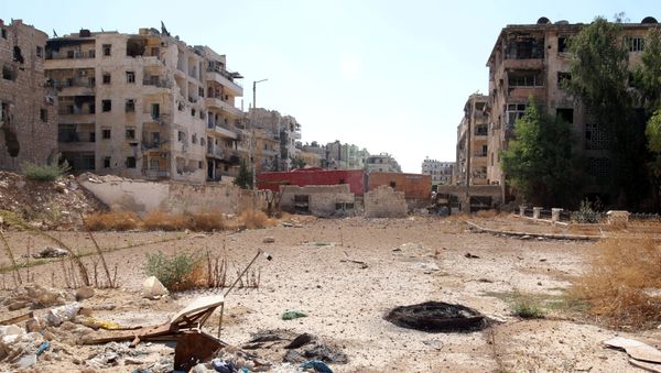 A view shows what is believed to be one of the roads that people would have to use to access one of the safe exit points opened for people wishing to leave rebel-held areas, in Aleppo's Bustan al-Qasr, Syria October 20, 2016. - Sputnik International
