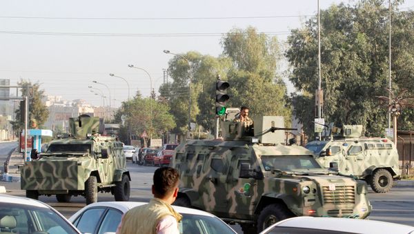 Military vehicles of peshmerga forces are seen at a site of an attack by Islamic State militants in Kirkuk, Iraq, October 21, 2016. Military vehicles of peshmerga forces are seen at a site of an attack by Islamic State militants in Kirkuk, Iraq, October 21, 2016. - Sputnik International