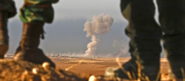 Iraqi Kurdish Peshmerga fighters stand in an area near the town of Bashiqa, some 25 kilometres north east of Mosul Iraqi Kurdish Peshmerga fighters stand in an area near the town of Bashiqa, some 25 kilometres north east of Mosul - Sputnik International
