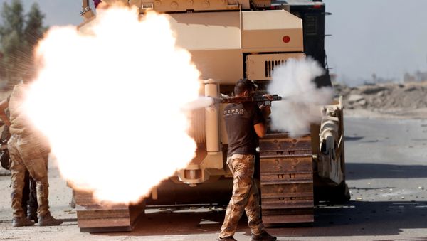 An Iraqi special forces soldier fires an RPG during clashes with Islamic States fighters in Bartella, east of Mosul, Iraq October 20, 2016. An Iraqi special forces soldier fires an RPG during clashes with Islamic States fighters in Bartella, east of Mosul, Iraq October 20, 2016. - Sputnik International