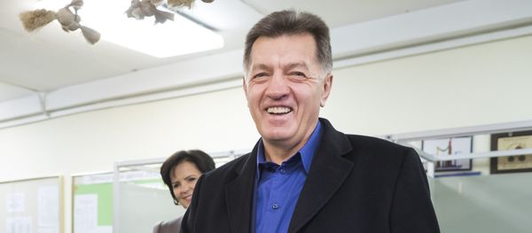 Lithuania's Social Democrat party leader and Prime Minister Algirdas Butkevicius votes at a polling station during parliamentary elections in Vilnius, Lithuania, Sunday, Oct. 23, 2016 Lithuania's Social Democrat party leader and Prime Minister Algirdas Butkevicius votes at a polling station during parliamentary elections in Vilnius, Lithuania, Sunday, Oct. 23, 2016 - Sputnik International
