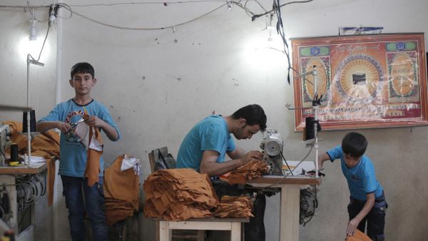 Syrian refugees, including children, work at a clothes workshop in Gaziantep, southeastern Turkey (File) Syrian refugees, including children, work at a clothes workshop in Gaziantep, southeastern Turkey (File) - Sputnik International