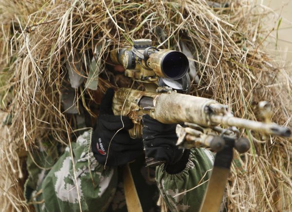 A sniper is seen during the Southern Military District’s Special Purpose Brigade drills in the Krasnodar region. A sniper is seen during the Southern Military District’s Special Purpose Brigade drills in the Krasnodar region. - Sputnik International