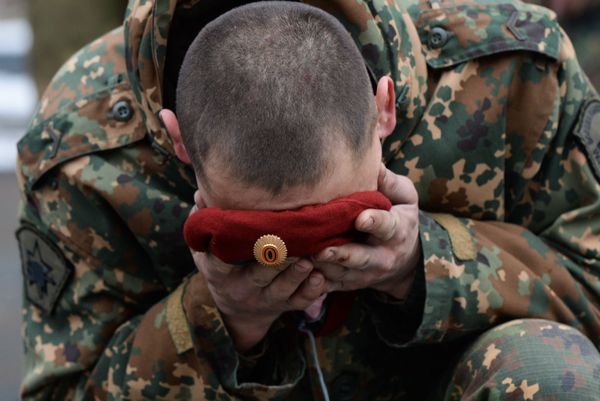A soldier of the Special Purpose unit of the Federal National Guard Troops Service is seen during a ceremony, held after trials for the right to wear the maroon and dark green berets at the training center Gorny in the Novosibirsk region. Maroon and dark green berets are worn by members of elite Ministry of Internal Affairs Spetsnaz units. A soldier of the Special Purpose unit of the Federal National Guard Troops Service is seen during a ceremony, held after trials for the right to wear the maroon and dark green berets at the training center Gorny in the Novosibirsk region. Maroon and dark green berets are worn by members of elite Ministry of Internal Affairs Spetsnaz units. - Sputnik International