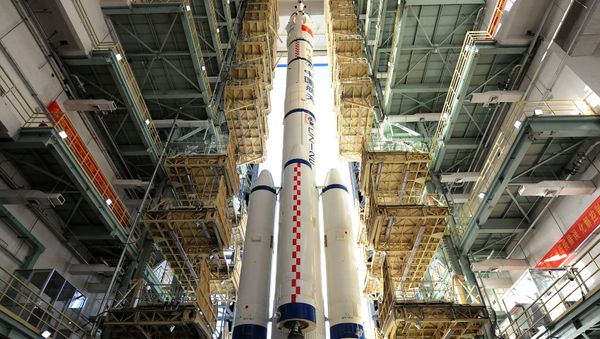 China's Long March rocket carrying the manned spacecraft Shenzhou-11 is seen at the launch centre in Jiuquan, China, October 10, 2016 - Sputnik International
