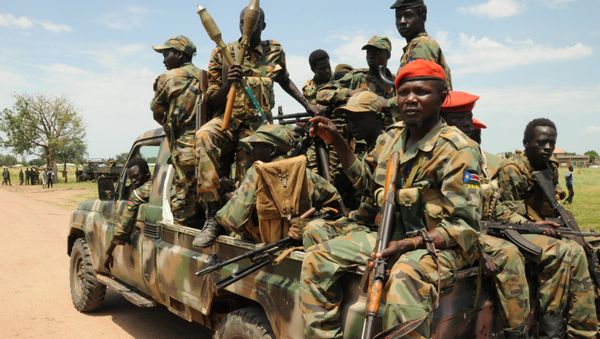 Sudan People's Liberation Army (SPLA) forces patrol the camp of Lalo following heavy fighting over the weekend that killed dozens of people, close to Malakal, South Sudan, October 16, 2016 - Sputnik International