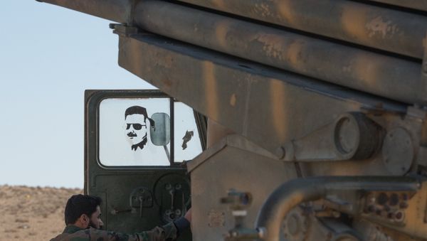 A soldier of the Syrian Arab Army (SAA) near the town of Mhin, Syria - Sputnik International