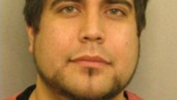 Mario Antoine, 33, of Raymore, was charged in a 21-count federal indictment on Monday. - Sputnik International