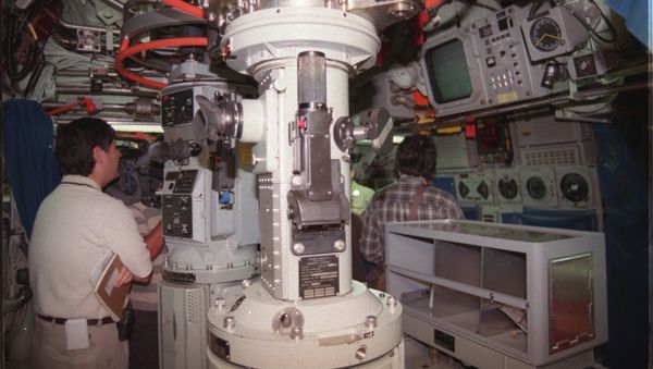 This undated photo released by US Navy 25 February 2001 shows the periscope station onboard the USS Los Angeles Class fast attack submarine USS Columbia, a vessel similiar to the USS Greeneville, the submarine that collide with the Japanese trawler Ehime Maru 09 February 2001. This undated photo released by US Navy 25 February 2001 shows the periscope station onboard the USS Los Angeles Class fast attack submarine USS Columbia, a vessel similiar to the USS Greeneville, the submarine that collide with the Japanese trawler Ehime Maru 09 February 2001. - Sputnik International