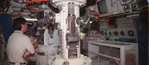 This undated photo released by US Navy 25 February 2001 shows the periscope station onboard the USS Los Angeles Class fast attack submarine USS Columbia, a vessel similiar to the USS Greeneville, the submarine that collide with the Japanese trawler Ehime Maru 09 February 2001. This undated photo released by US Navy 25 February 2001 shows the periscope station onboard the USS Los Angeles Class fast attack submarine USS Columbia, a vessel similiar to the USS Greeneville, the submarine that collide with the Japanese trawler Ehime Maru 09 February 2001. - Sputnik International