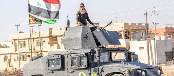 A Yazidi fighter taking part in the Iraqi army's operation to liberate Mosul A Yazidi fighter taking part in the Iraqi army's operation to liberate Mosul - Sputnik International