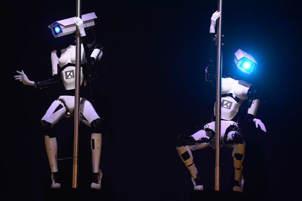 Robots from German company Tobit Software are brilliant pole dancers. The photo was made on the eve of the start of the 2014 CeBIT (Centrum für Büroautomation, Informationstechnologie und Telekommunikation) technology trade fair on March 9, 2014, in Hanover. Robots from German company Tobit Software are brilliant pole dancers. The photo was made on the eve of the start of the 2014 CeBIT (Centrum für Büroautomation, Informationstechnologie und Telekommunikation) technology trade fair on March 9, 2014, in Hanover. - Sputnik International