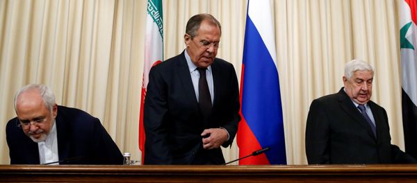 Russian Foreign Minister Sergei Lavrov (C), Syrian Foreign Minister Walid al-Muallem (R) and Iranian Foreign Minister Mohammad Javad Zarif attend a news conference in Moscow, Russia, October 28, 2016. Russian Foreign Minister Sergei Lavrov (C), Syrian Foreign Minister Walid al-Muallem (R) and Iranian Foreign Minister Mohammad Javad Zarif attend a news conference in Moscow, Russia, October 28, 2016. - Sputnik International