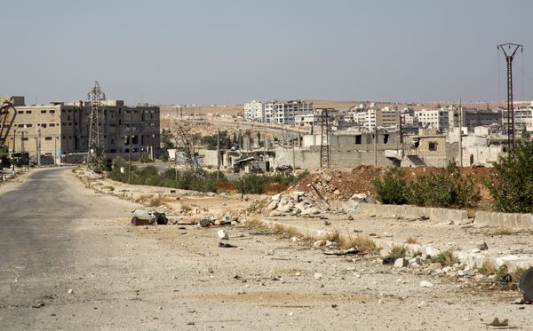 A general view shows a damaged road and abandoned buildings in Aleppo's militant-held Kalasa neighbourhood A general view shows a damaged road and abandoned buildings in Aleppo's militant-held Kalasa neighbourhood - Sputnik International