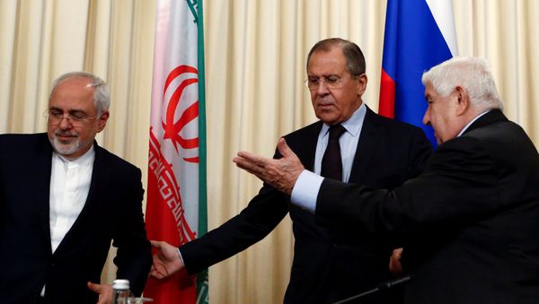 Russian Foreign Minister Sergei Lavrov (C) and his counterparts Walid al-Muallem (R) from Syria and Mohammad Javad Zarif from Iran attend a news conference in Moscow, Russia, October 28, 2016. Russian Foreign Minister Sergei Lavrov (C) and his counterparts Walid al-Muallem (R) from Syria and Mohammad Javad Zarif from Iran attend a news conference in Moscow, Russia, October 28, 2016. - Sputnik International
