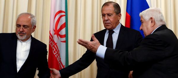 Russian Foreign Minister Sergei Lavrov (C) and his counterparts Walid al-Muallem (R) from Syria and Mohammad Javad Zarif from Iran attend a news conference in Moscow, Russia, October 28, 2016. - Sputnik International