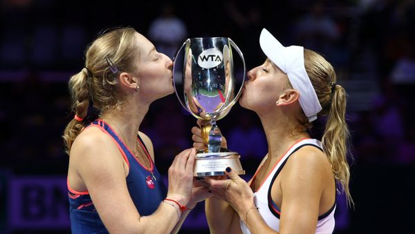 Tennis - Singapore WTA Finals Doubles Finals - Singapore Indoor Stadium, Singapore - 30/10/2016 - Ekaterina Makarova of Russia and Elena Vesnina of Russia celebrate after defeating Bethanie Mattek-Sands of the U.S. and Lucie Safarova of the Czech Republic - Sputnik International