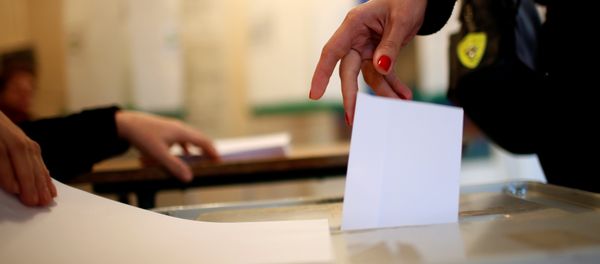 A woman casts her ballot during the second round of parliamentary election in Tbilisi, Georgia, October 30, 2016. A woman casts her ballot during the second round of parliamentary election in Tbilisi, Georgia, October 30, 2016. - Sputnik International