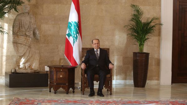 Newly elected Lebanese president Michel Aoun sits on the president's chair inside the presidential palace in Baabda, near Beirut, Lebanon October 31, 2016 - Sputnik International