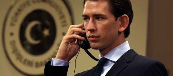 Austria's Foreign Minister Sebastian Kurz listens to his Turkish counterpart Feridun Sinirlioglu after talks in Ankara, Turkey, Saturday, Sept. 19, 2015 Austria's Foreign Minister Sebastian Kurz listens to his Turkish counterpart Feridun Sinirlioglu after talks in Ankara, Turkey, Saturday, Sept. 19, 2015 - Sputnik International