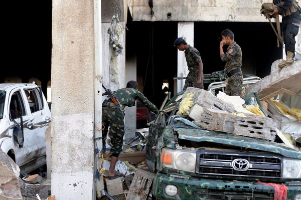 Men inspect the site of an airstrike which witnesses said was by Saudi-led coalition aircraft on mourners at a hall where a wake for the father of Jalal al-Roweishan, the interior minister in the Houthi-dominated Yemeni government, was being held, in Sanaa, Yemen October 8, 2016. Men inspect the site of an airstrike which witnesses said was by Saudi-led coalition aircraft on mourners at a hall where a wake for the father of Jalal al-Roweishan, the interior minister in the Houthi-dominated Yemeni government, was being held, in Sanaa, Yemen October 8, 2016. - Sputnik International