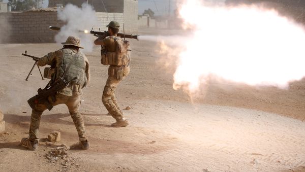 Members of an Iraqi special forces police unit fire their weapons at Islamic State fighters in al-Shura, south of Mosul, Iraq October 29, 2016 Members of an Iraqi special forces police unit fire their weapons at Islamic State fighters in al-Shura, south of Mosul, Iraq October 29, 2016 - Sputnik International