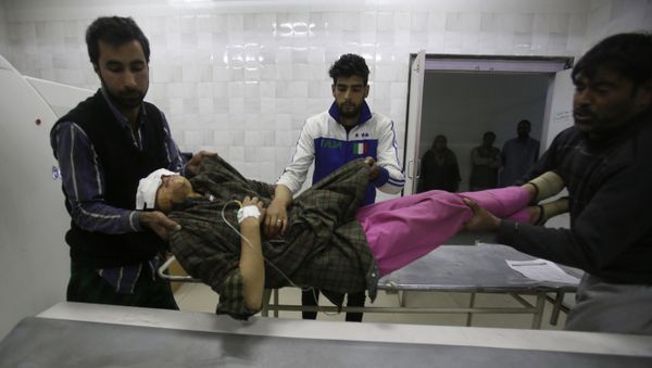 An injured Kashmiri woman is brought for treatment to a hospital in Srinagar, Indian controlled Kashmir, Monday, Oct. 31, 2016 An injured Kashmiri woman is brought for treatment to a hospital in Srinagar, Indian controlled Kashmir, Monday, Oct. 31, 2016 - Sputnik International