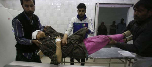 An injured Kashmiri woman is brought for treatment to a hospital in Srinagar, Indian controlled Kashmir, Monday, Oct. 31, 2016 An injured Kashmiri woman is brought for treatment to a hospital in Srinagar, Indian controlled Kashmir, Monday, Oct. 31, 2016 - Sputnik International