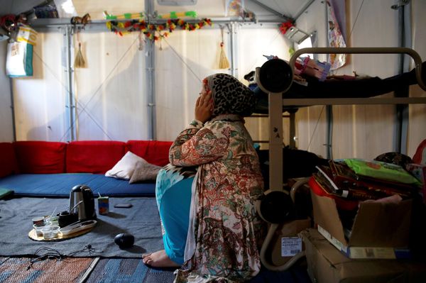Syrian refugee Walaa, 26, sits inside her family's tent at the Souda municipality-run camp on the island of Chios, Greece, September 7, 2016. Syrian refugee Walaa, 26, sits inside her family's tent at the Souda municipality-run camp on the island of Chios, Greece, September 7, 2016. - Sputnik International