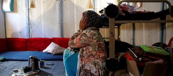 Syrian refugee Walaa, 26, sits inside her family's tent at the Souda municipality-run camp on the island of Chios, Greece, September 7, 2016. Syrian refugee Walaa, 26, sits inside her family's tent at the Souda municipality-run camp on the island of Chios, Greece, September 7, 2016. - Sputnik International