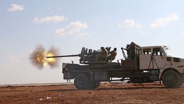 Fighters from the Free Syrian Army fire an anti-aircraft machine gun mounted on a vehicle deploy during fighting against the Islamic State (IS) group jihadists (File) Fighters from the Free Syrian Army fire an anti-aircraft machine gun mounted on a vehicle deploy during fighting against the Islamic State (IS) group jihadists (File) - Sputnik International
