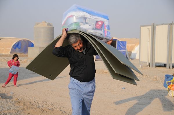 In this photo residents of Mosul and the nearby villages are seen being accomodated in the Hazir refugee camp In this photo residents of Mosul and the nearby villages are seen being accomodated in the Hazir refugee camp - Sputnik International